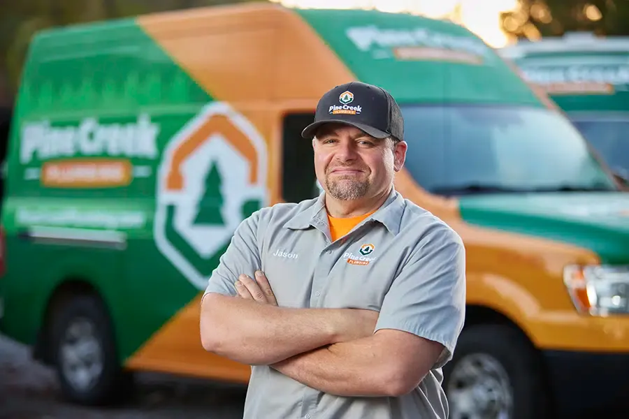 Pine Creek Plumbing owner with truck in background