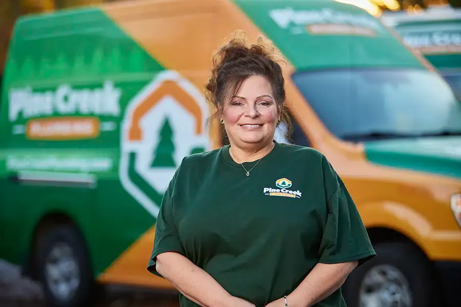 Pine Creek customer service representative with van in background