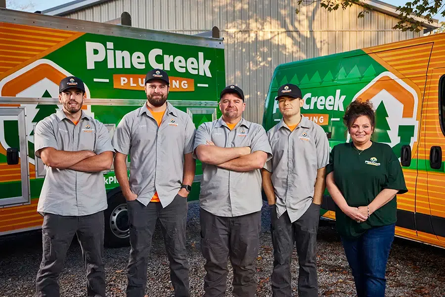 Pine Creek Plumbing team and trucks