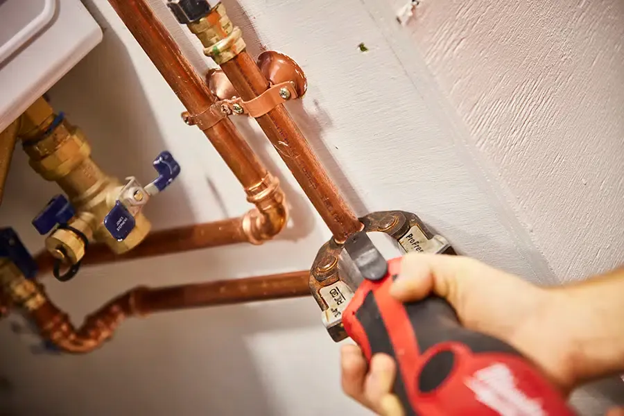 closeup of pipe repair by Pine Creek Plumbing plumber