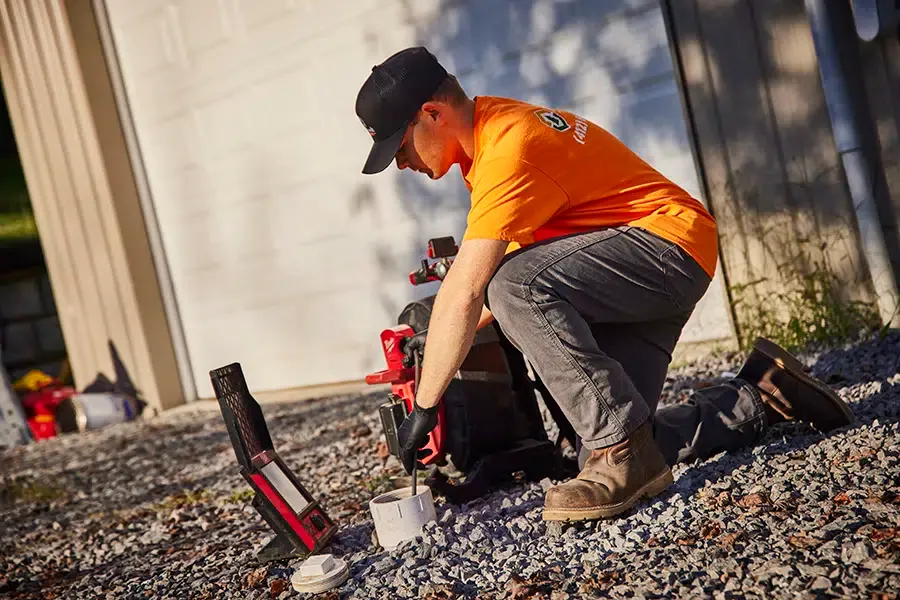 Pine Creek Plumber working outside Wexford, PA home